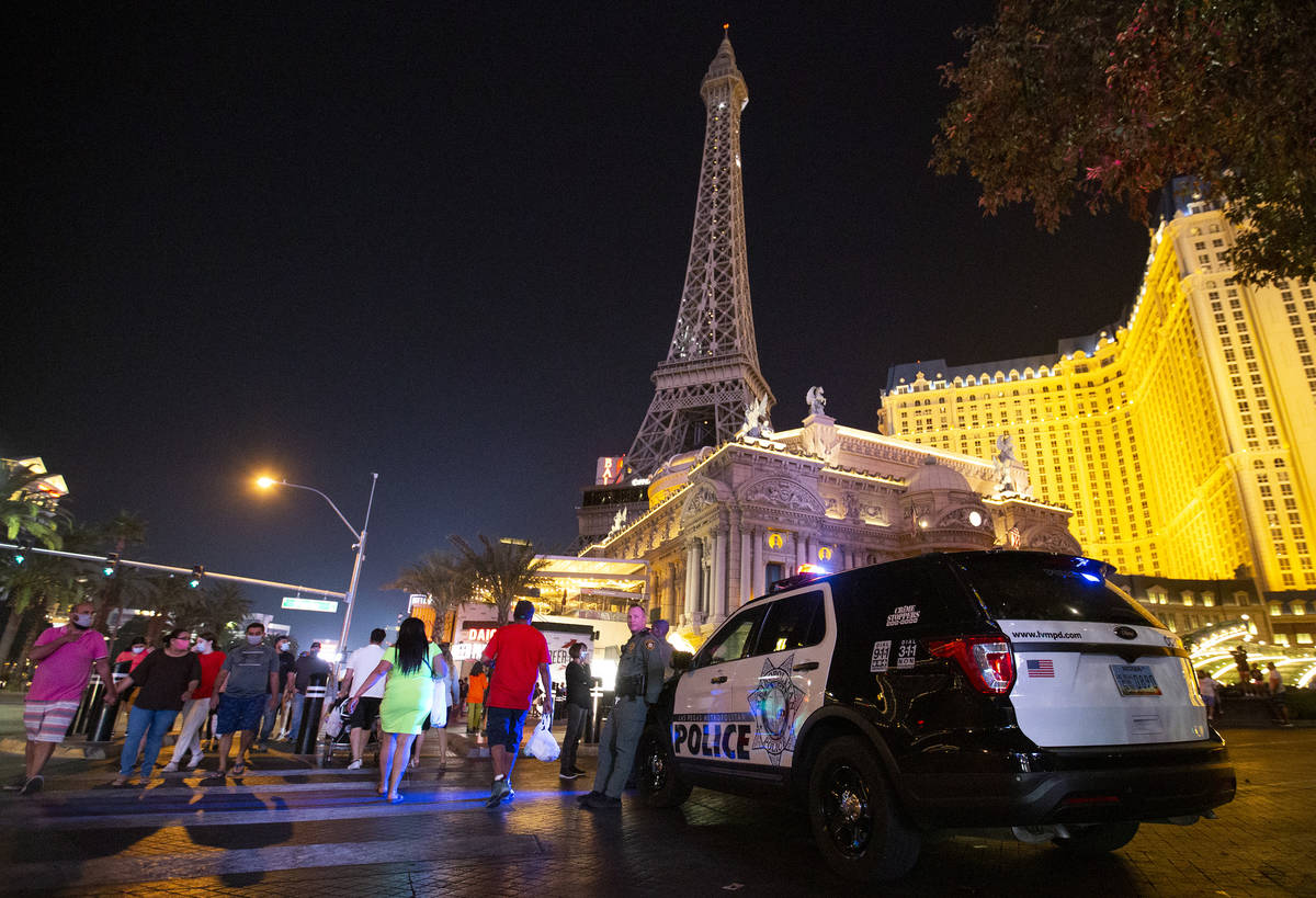 Metropolitan police are present outside Paris Las Vegas following a major power outage in the h ...