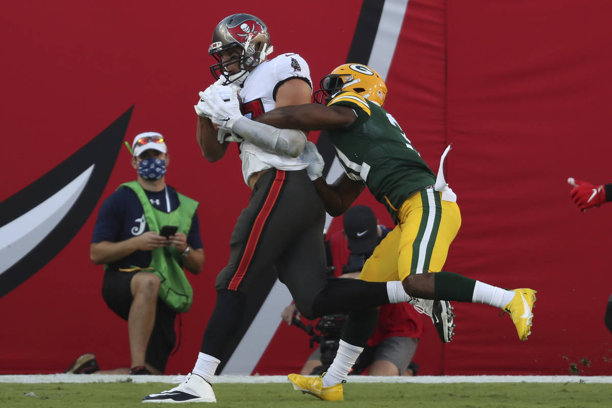 Tampa Bay Buccaneers tight end Rob Gronkowski (87) makes a touchdown catch in front of Green Ba ...