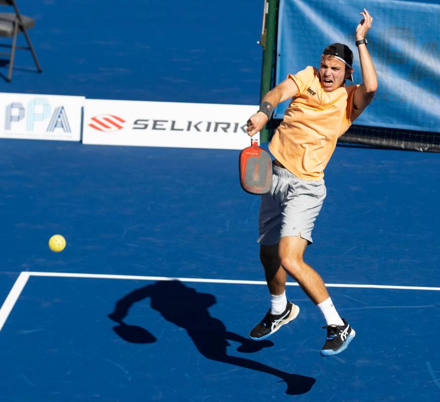 Colin Jones returns the ball to Zane Navratil, of Racine, Wis., during the 2020 Pro Pickleball ...