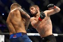 In this Sept. 7 2019, file photo, Russian UFC fighter Khabib Nurmagomedov, right, fights with U ...