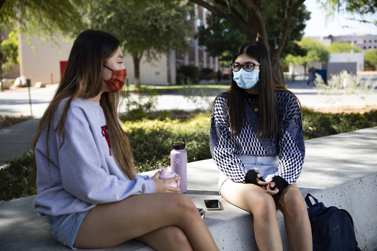 Michelle Kim, a pre-nursing sophomore, left, hangs out with her friend Savannah Judnich, right, ...