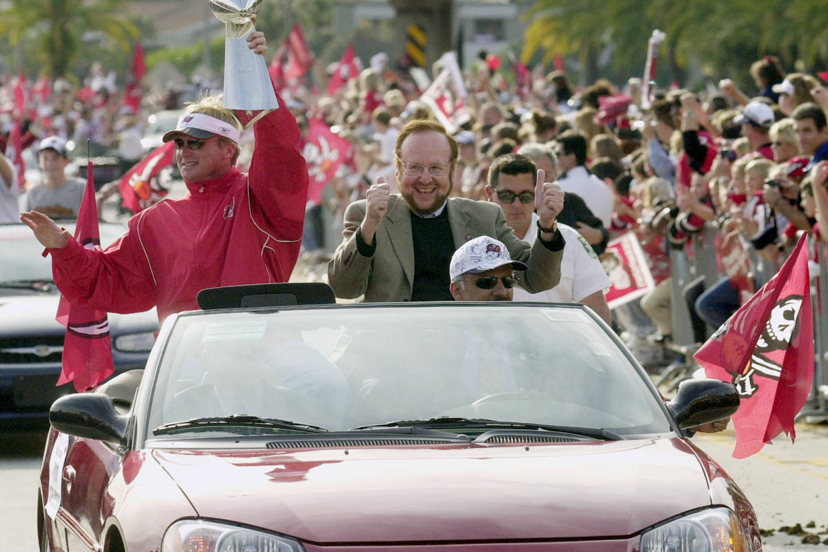 Tampa Bay Buccaneers head coach Jon Gruden, left, and team owner Malcolm Glazer celebrate with ...