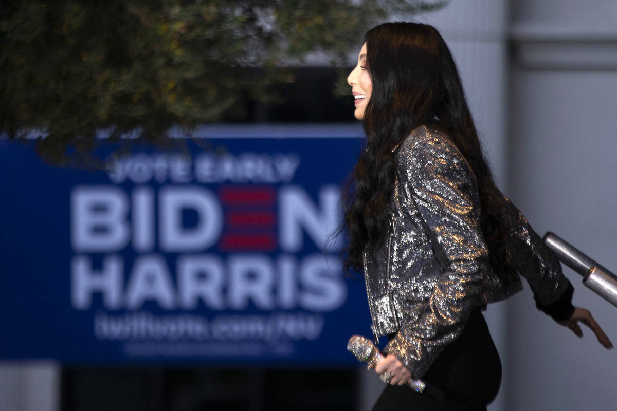 Cher walks onstage at a voter mobilization event at The Gramercy Residences courtyard on Saturd ...