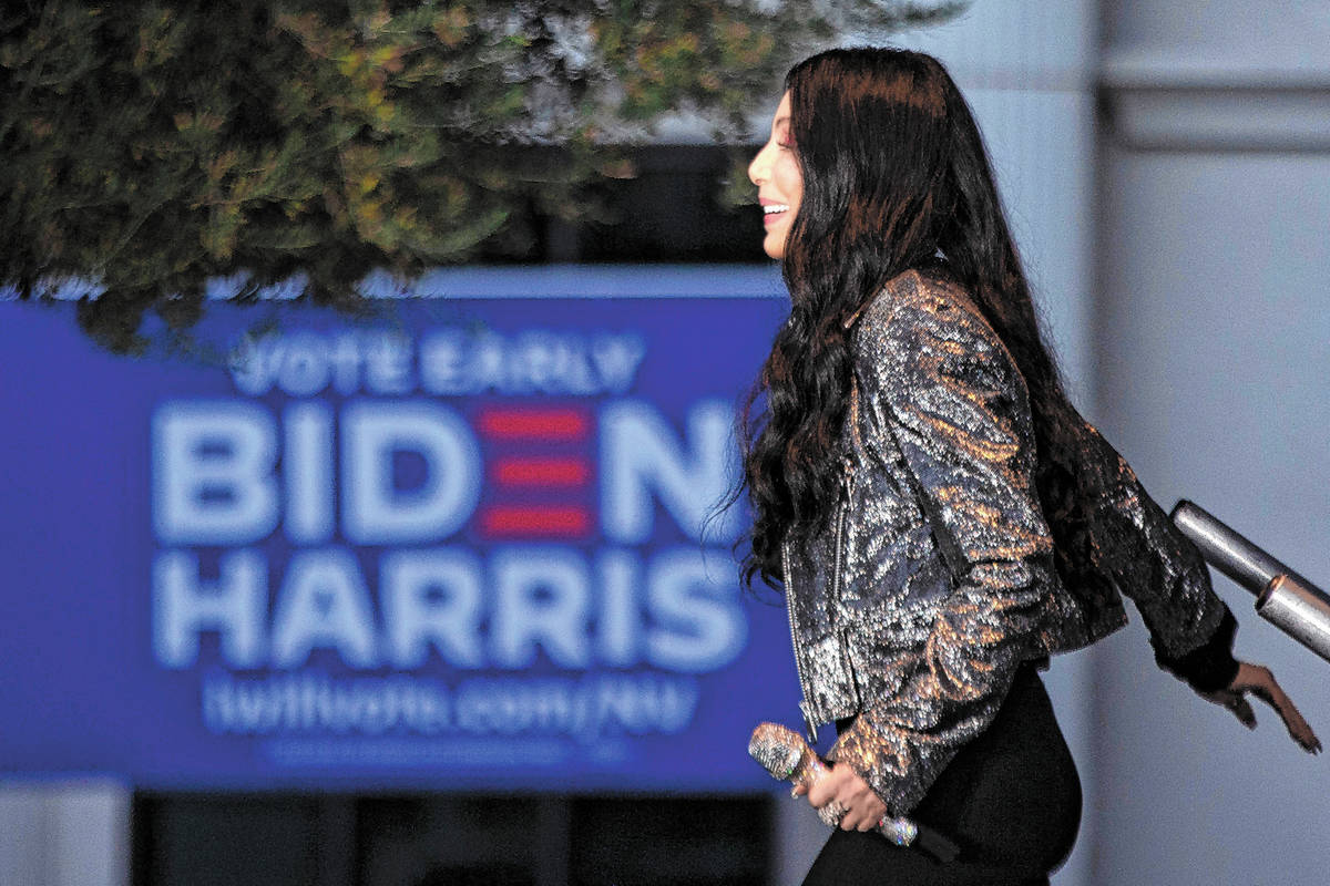 Cher walks onstage at a voter mobilzation event at The Gramercy Residences courtyard on Saturda ...