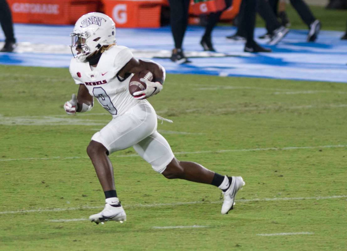 UNLV’s Tyleek Collins runs the ball on a punt return during Saturday's Mountain West confere ...