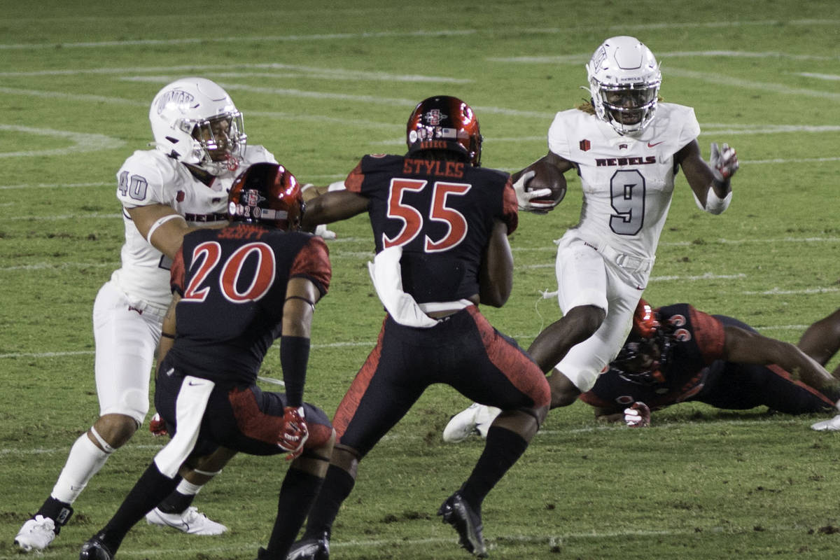 UNLV’s Tyleek Collins runs the ball back on a kickoff return during Saturday's Mountain West ...