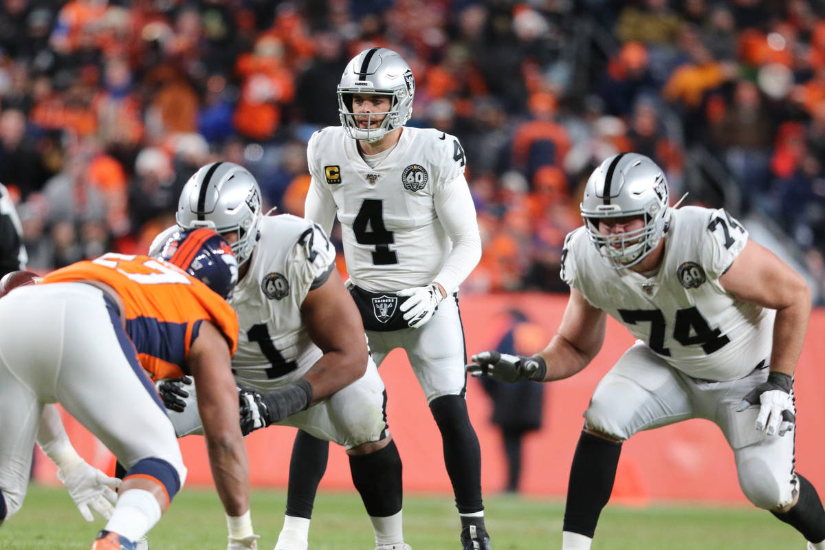 Oakland Raiders quarterback Derek Carr (4) sets up behind his offensive linemen Rodney Hudson ( ...