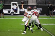 Tampa Bay Buccaneers quarterback Tom Brady (12) throws against the against the Las Vegas Raider ...