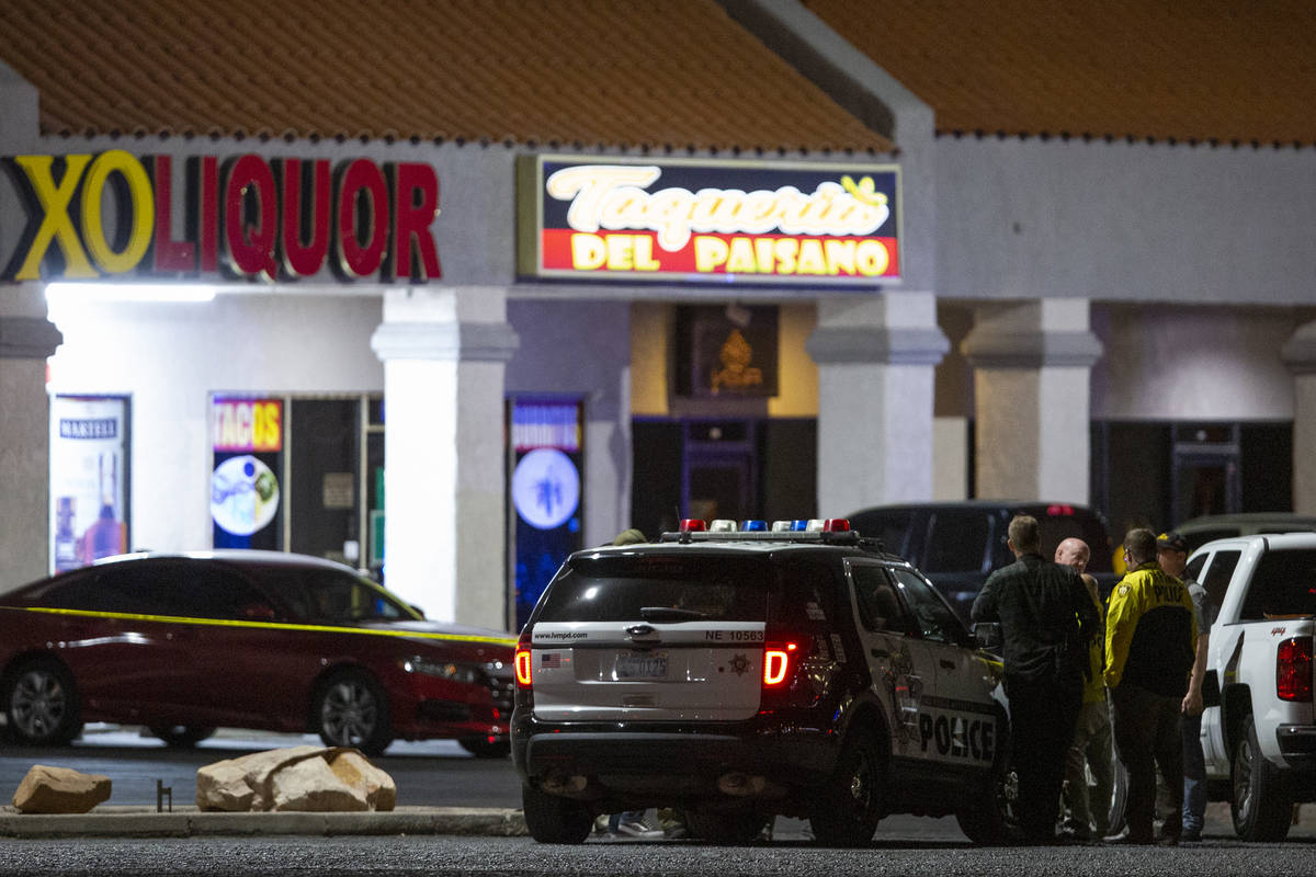 Metropolitan police investigate a homicide at a business near 3603 North Las Vegas Boulevard on ...