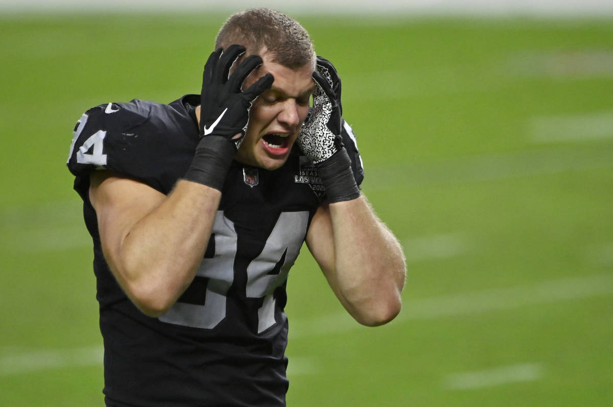 Las Vegas Raiders defensive end Carl Nassib (94) reacts after the Las Vegas  Raiders lost to the …
