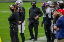 Las Vegas Raiders head coach Jon Gruden, center, walks the sideline during the 4th quarter of a ...
