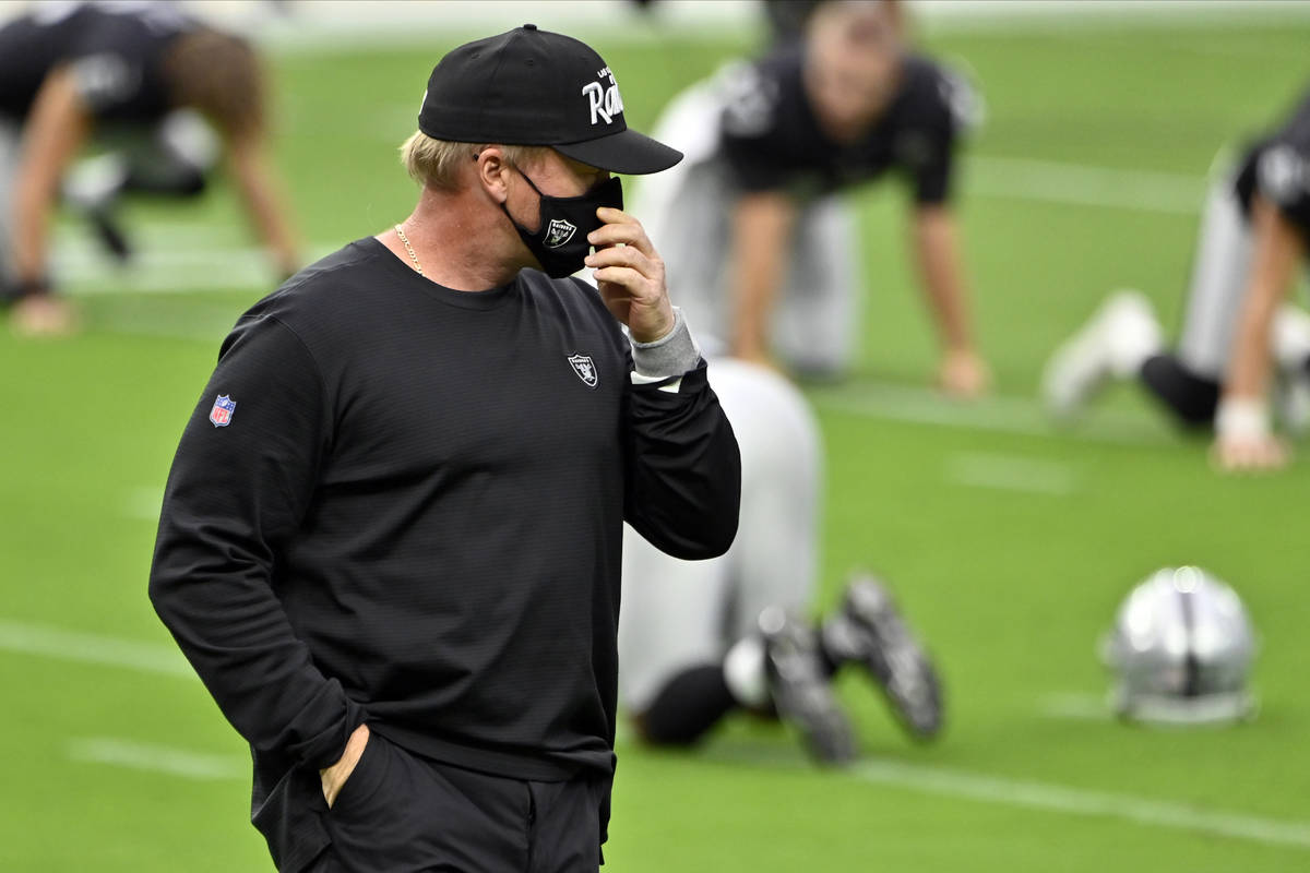 Las Vegas Raiders coach Jon Gruden on the field before an NFL football game between the Las Veg ...