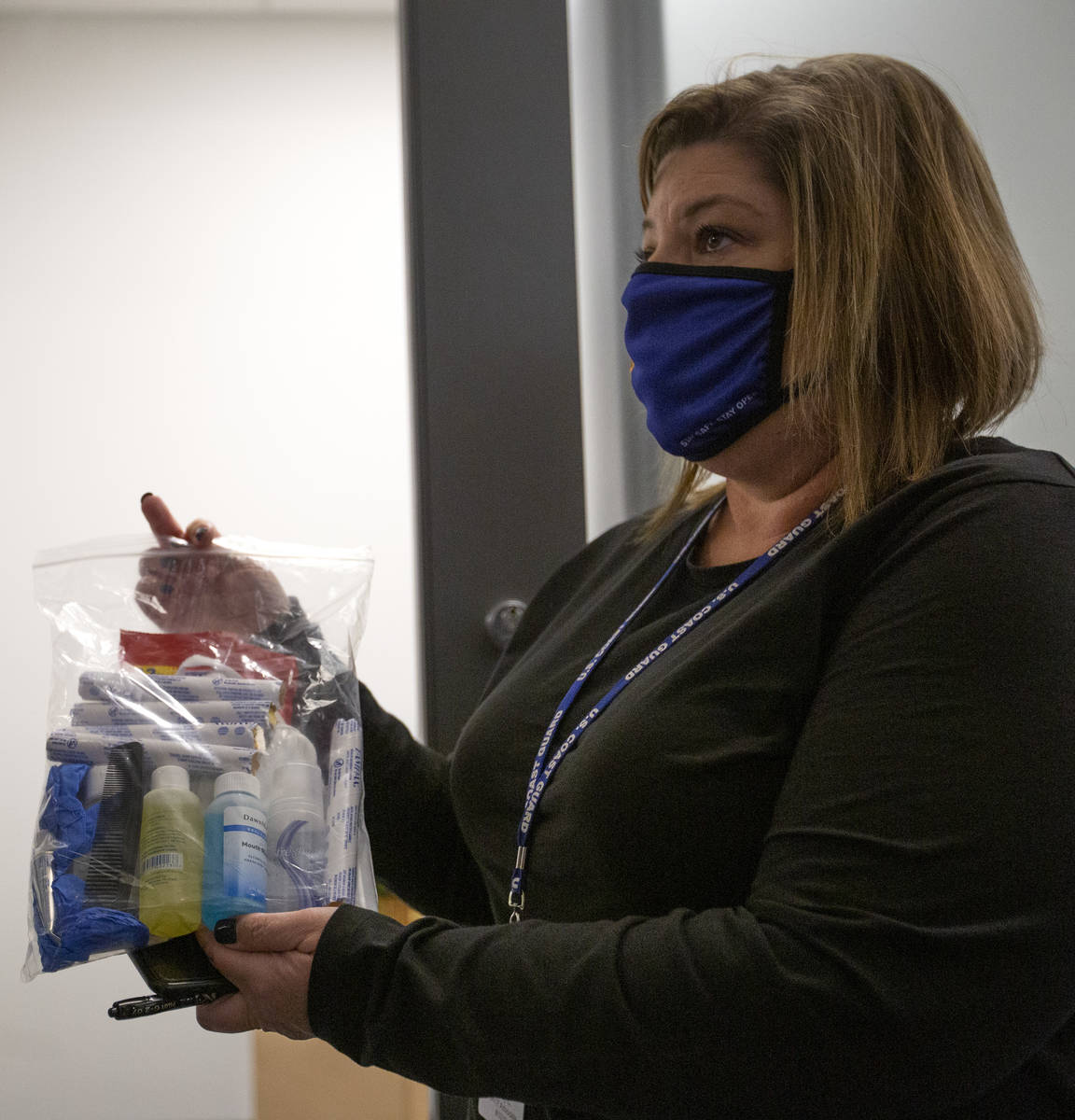 Brandi Carman, SafeNest director of dispatch, shows a hygeine kit that can be distributed to th ...
