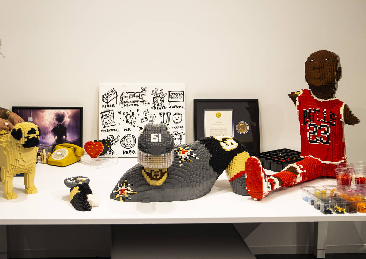 An in-progress sculpture of Golden Knights' Mark Stone is seen next to basketball legend Michae ...