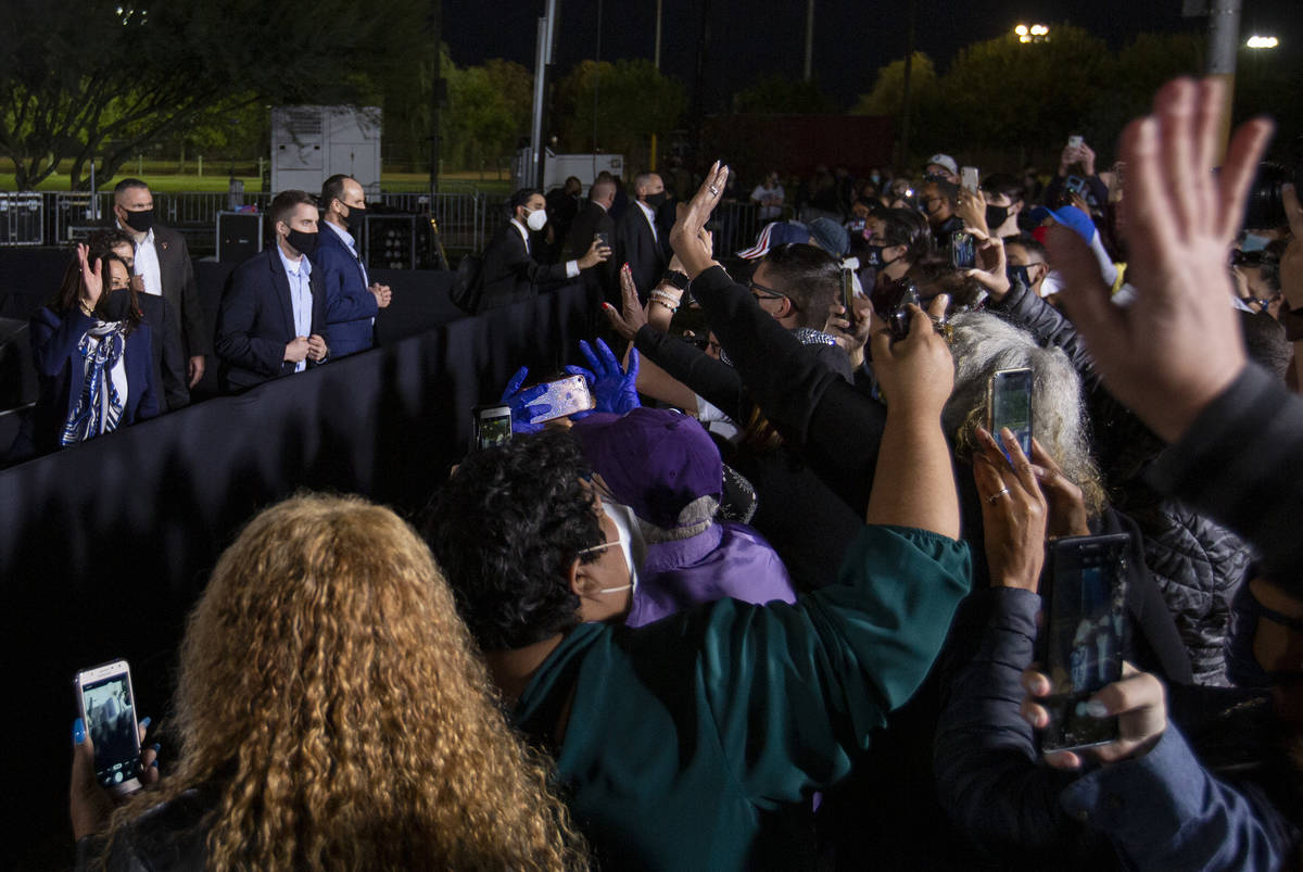 A crowd of audience members gathers to wave to vice presidential candidate Sen. Kamala Harris f ...