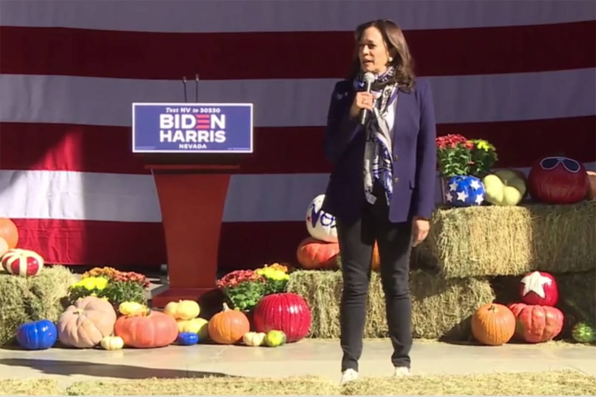 Democratic vice presidential candidate Sen. Kamala Harris, D-Calif., talks to supporters Tuesda ...