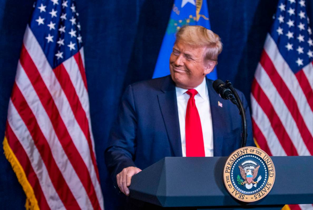 President Donald Trump listens to statements by Nevada business leaders large and small from th ...