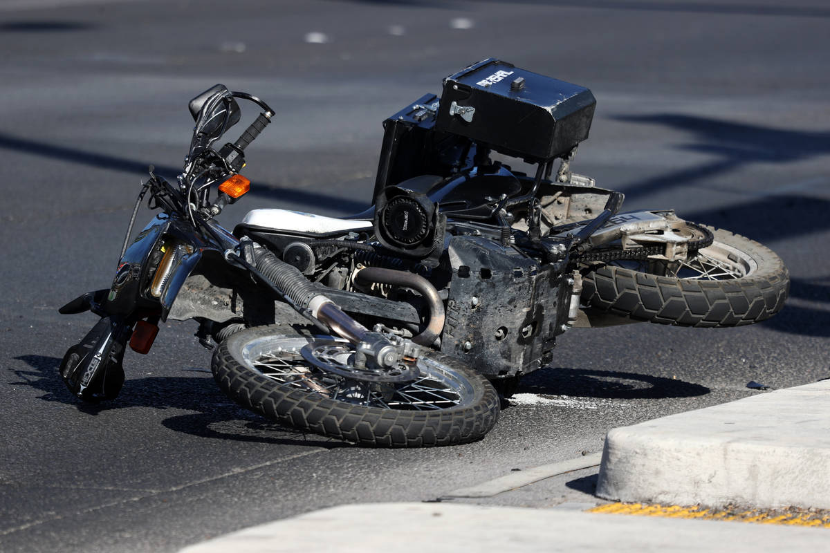 The scene of a car crash at the intersection of Rancho Drive and Palomino Lane in Las Vegas, We ...
