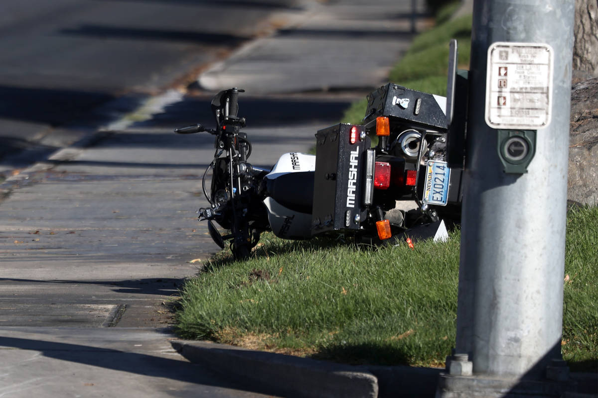 The scene of a car crash involving two Las Vegas City Marshals motorcycles at the intersection ...