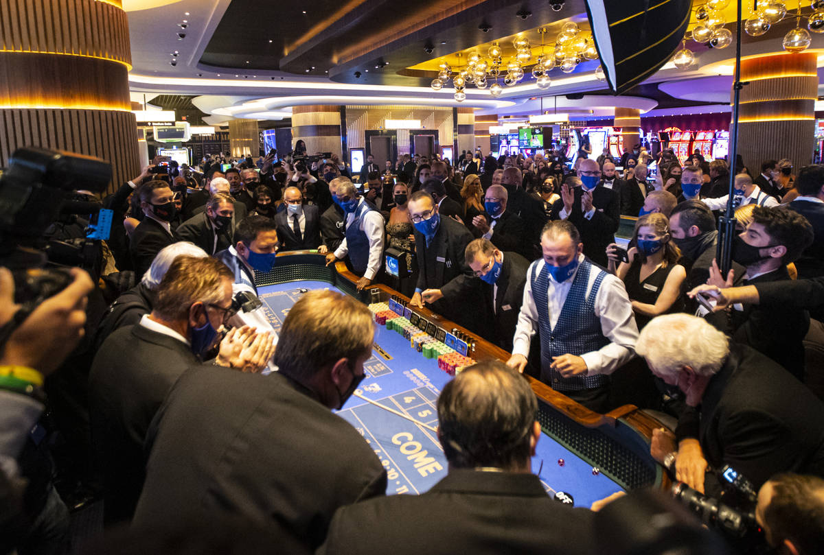 The first roll of the dice is thrown at a craps table at Circa during the grand opening event i ...