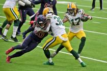 Green Bay Packers wide receiver Davante Adams (17) runs with the ball as Packers running back J ...