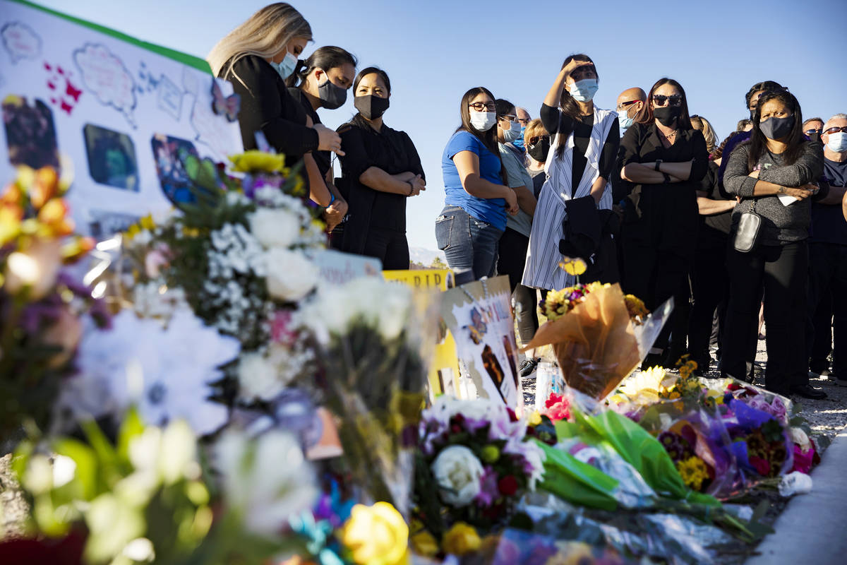 Mourners gather to pay their respects to Michelle Weissman, a bicyclist killed Sunday when a ma ...