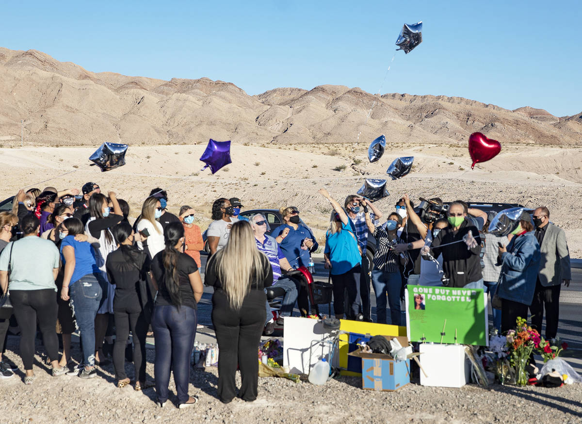 Mourners release balloons in honor Michelle Weissman, a bicyclist killed Sunday when a man lean ...