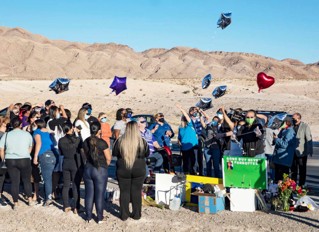 Mourners release balloons in honor Michelle Weissman, a bicyclist killed Sunday when a man lean ...
