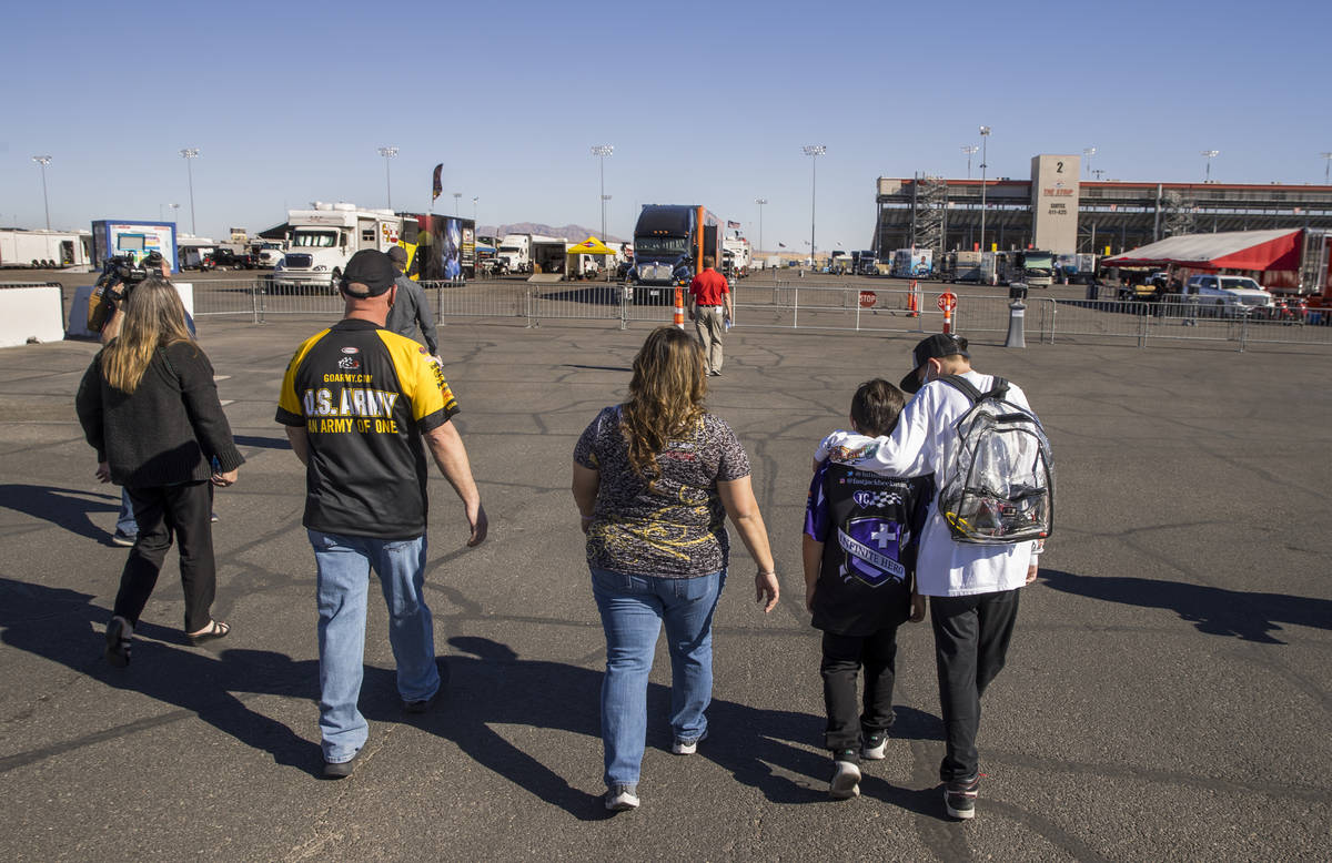 The Roberts family with Chairwoman of the Clark County Commission Marilyn Kirkpatrick, left, en ...