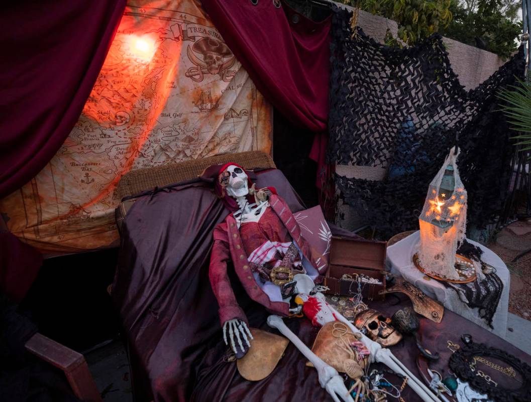 A skeleton scene from The Pirates of the Caribbean is seen in the GarciaÕs backyard for th ...