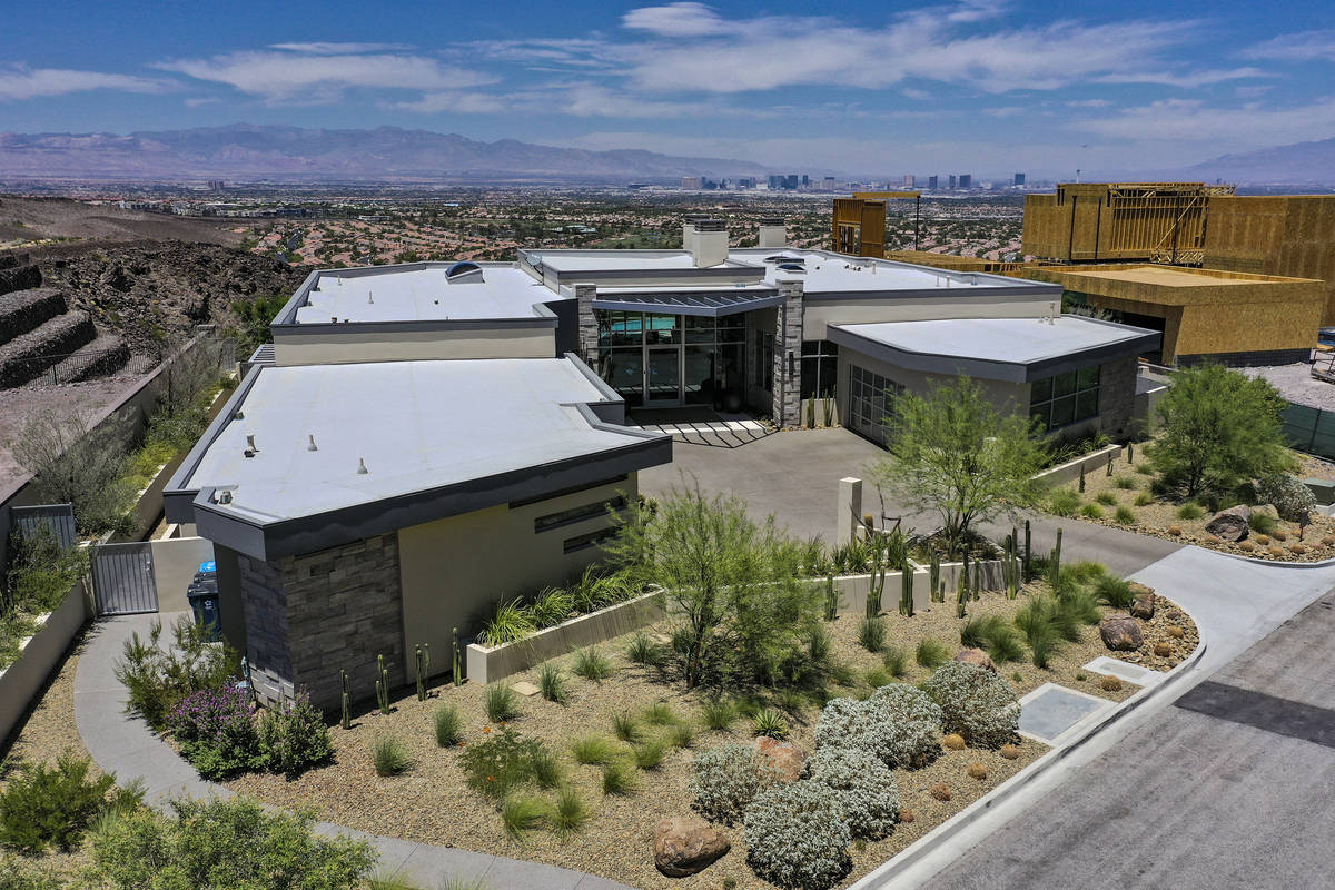 The one-story home sits on an 0.59-acre lot. (Huntington and Ellis)