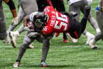 Atlanta Falcons defensive end Dante Fowler Jr. (56) tackles Detroit Lions running back D'Andre ...