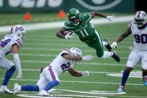 New York Jets wide receiver Denzel Mims (11) in action against Buffalo Bills safety Jordan Poye ...