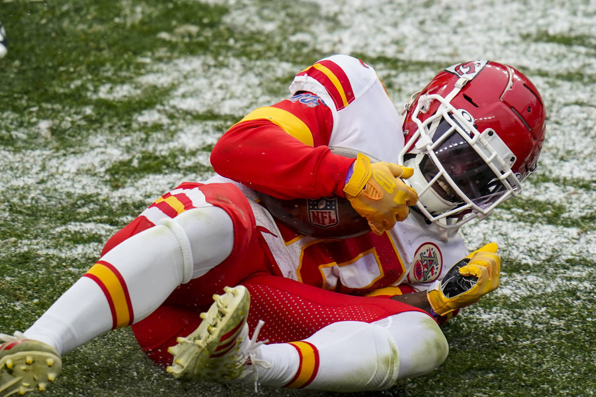 Kansas City Chiefs wide receiver Tyreek Hill (10) scores a touchdown against the Denver Broncos ...