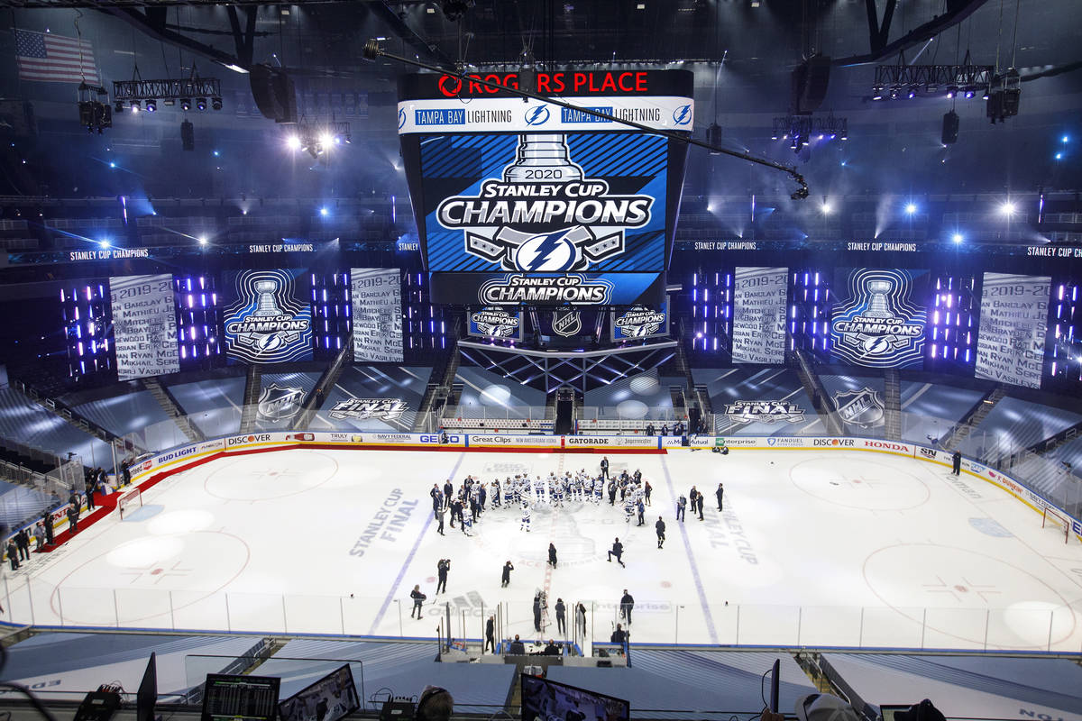 Tampa Bay Lightning players celebrate after defeating the Dallas Stars to win the Stanley Cup i ...