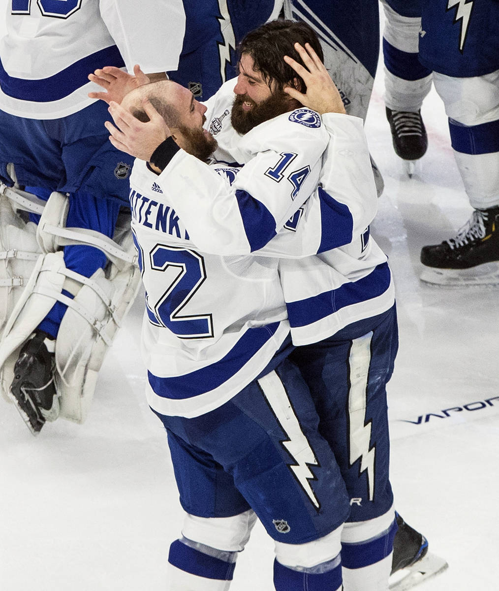 Tampa Bay Lightning's Kevin Shattenkirk (22) and Pat Maroon (14) celebrate after defeating the ...