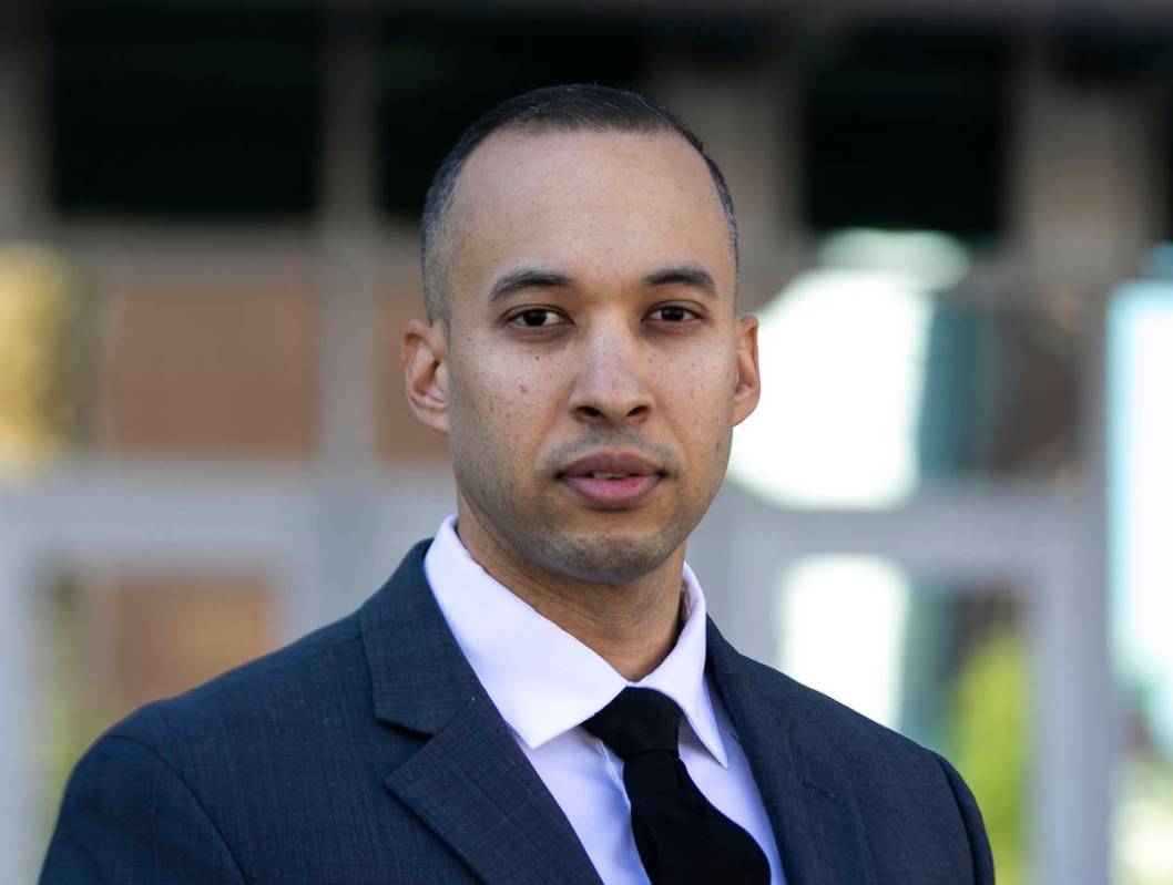 Solomon Coleman, a former officer who is suing the department, poses for a photo outside Metrop ...
