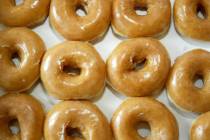 Krispy Kreme glazed doughnuts (Nell Redmond/ Bloomberg News)