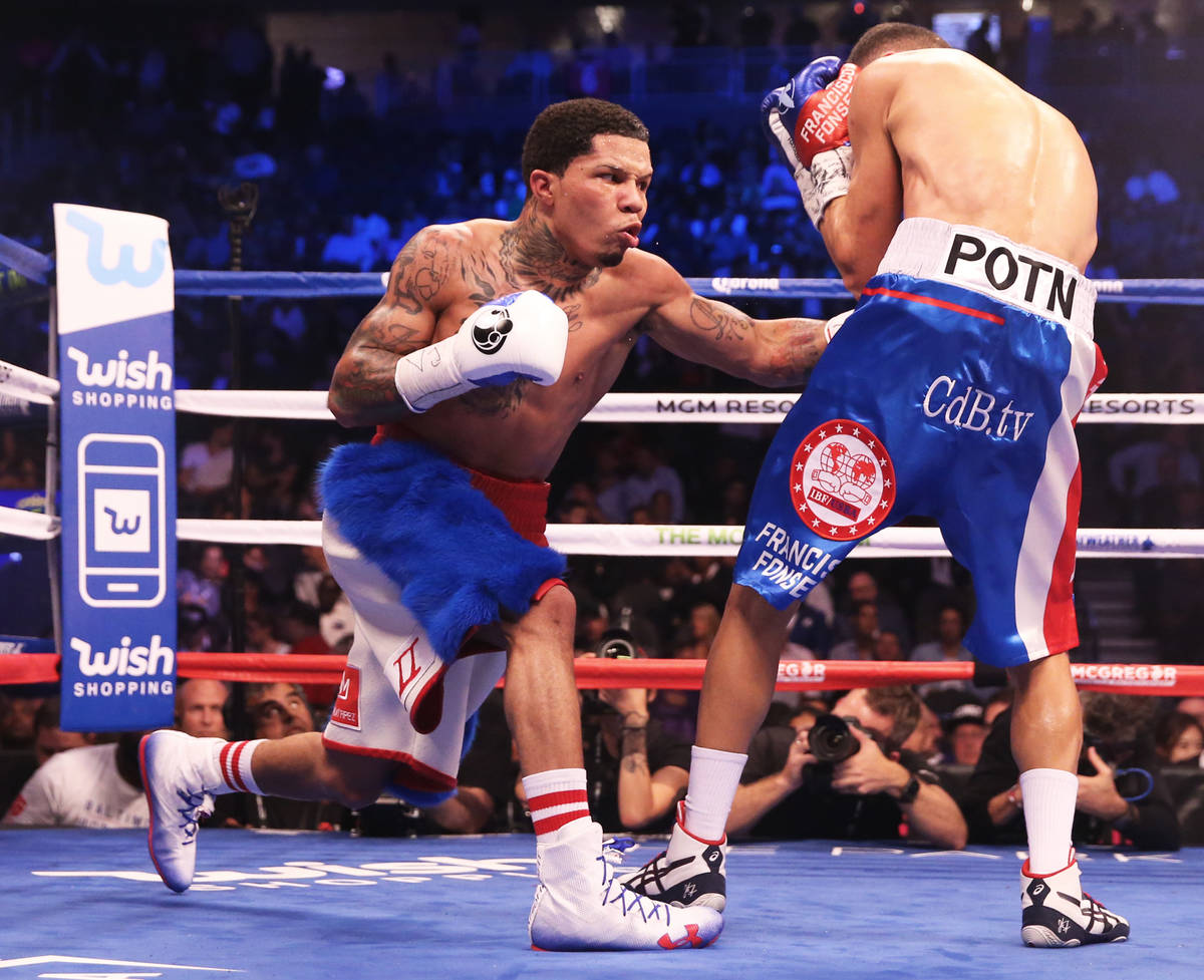 Gervonta Davis, left, throws a punch against Francisco Fonseca in the 5th round on Saturday, Au ...