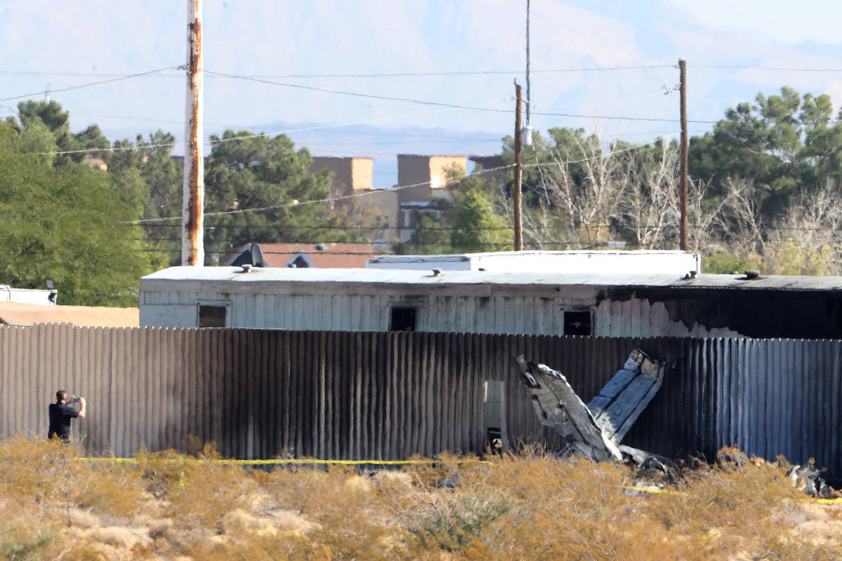 The scene of an airplane crash near the intersection of Pebble Road and South Valley View Boule ...