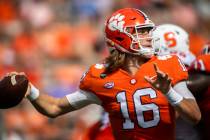 Clemson quarterback Trevor Lawrence (16) makes a pass during an NCAA college football game agai ...