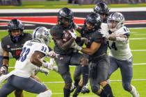 UNLV Rebels wide receiver Tyleek Collins (9) fights for more yards during a run during the firs ...