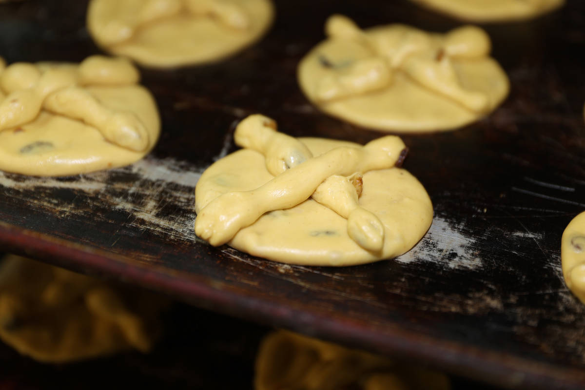 Pan de Muerto, Day of the Dead bread, is prepared for the oven at La Mexicana Bakery in Las Veg ...