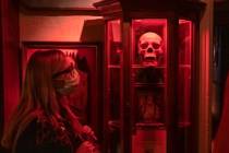 Brittany Pope, 28, of Jackson, Georgia, takes a tour of Zak Bagans' Haunted Museum on the eve o ...