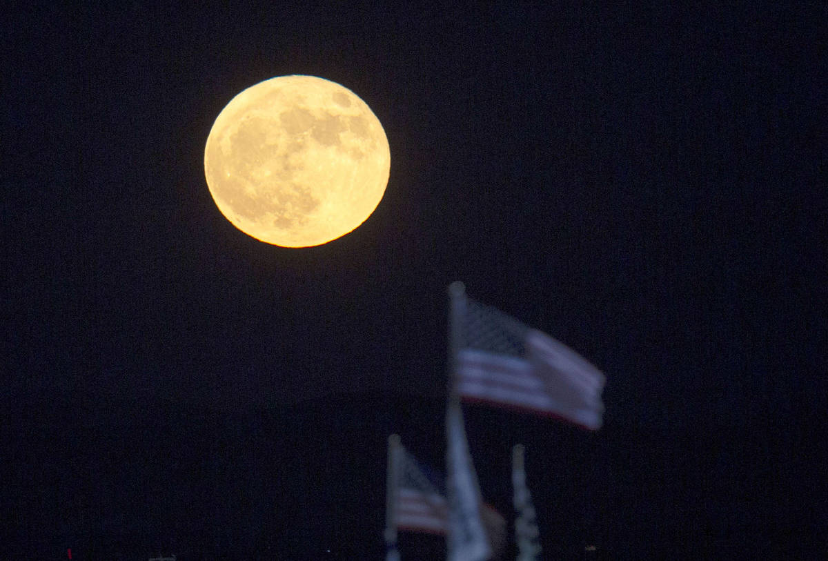 The "blue moon," which is named for being the second full moon in a month, above Las ...
