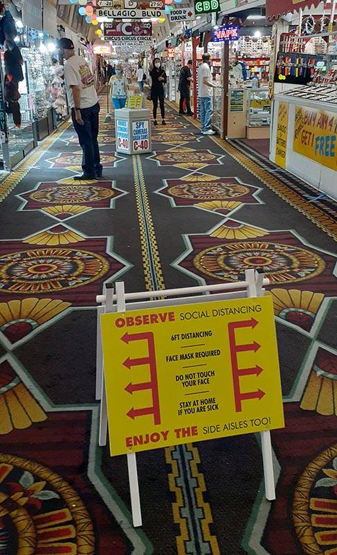 Signs placed in several spots remind patrons to follow rules on social distancing and various p ...