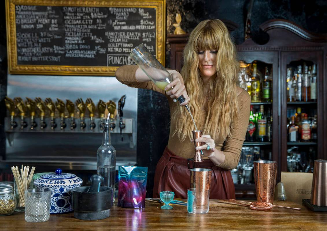Mariena Mercer Boarini prepares a cocktail behind the bar at the Velveteen Rabbit using Electra ...