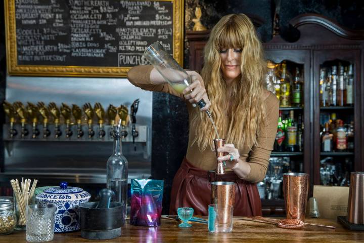 Mariena Mercer Boarini prepares a cocktail behind the bar at the Velveteen Rabbit using Electra ...