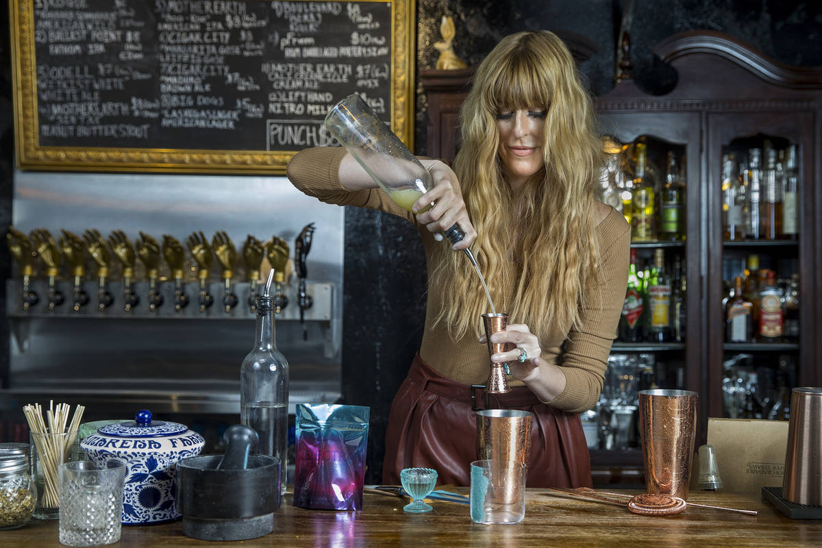 Mariena Mercer Boarini prepares a cocktail behind the bar at the Velveteen Rabbit using Electra ...