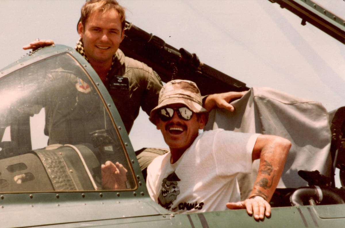Evan Thompson and Air Force Capt. Marc Frith are seen during an event at Nellis Air Force Base ...